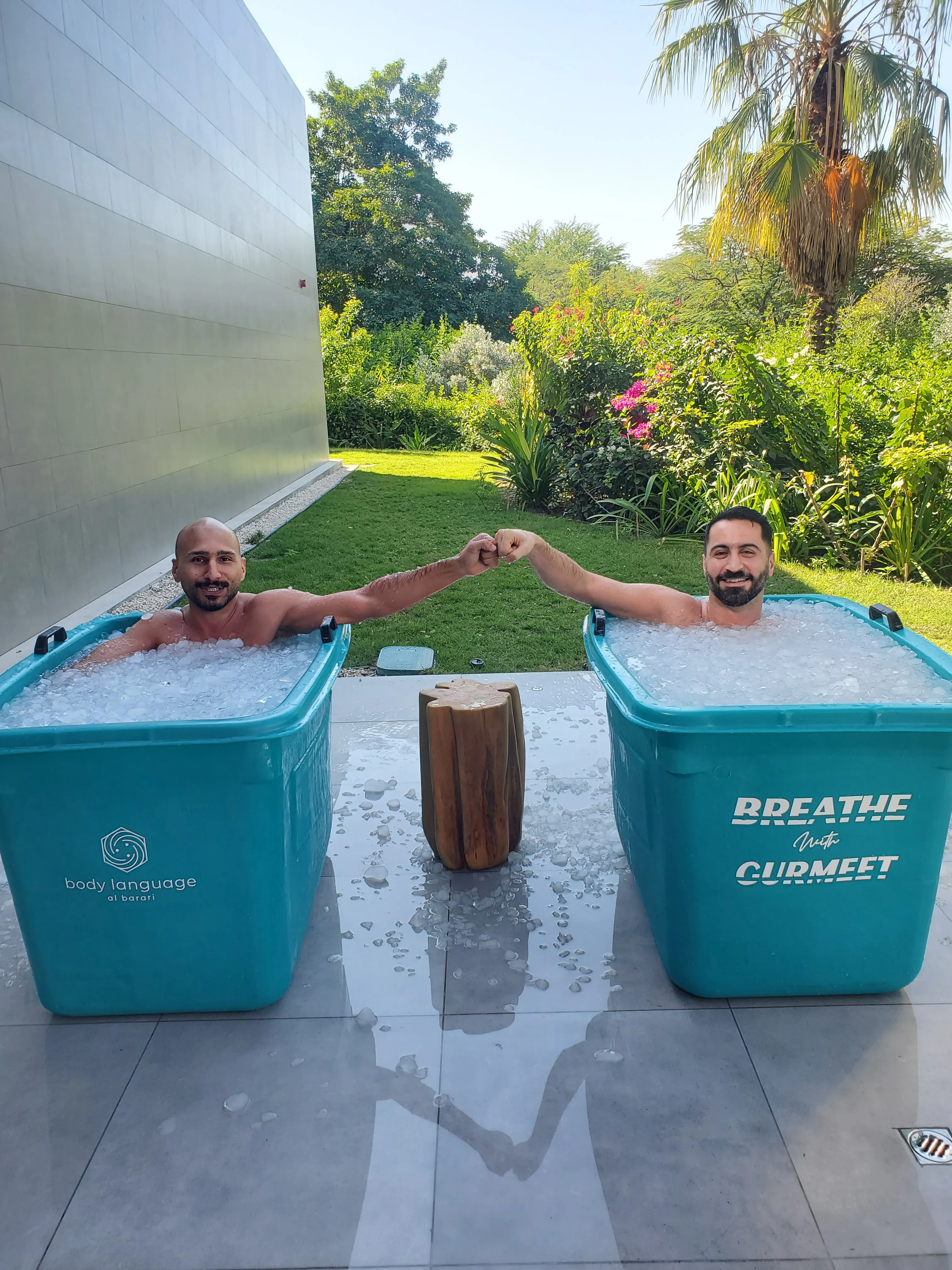 Two participants in a guided ice bath course session for resilience and nervous system regulation