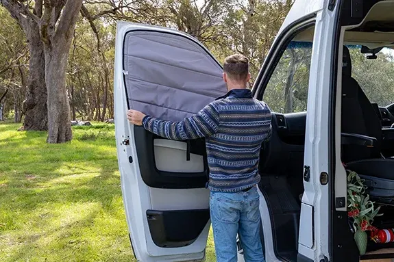Block-out insulated blinds inside campervan for privacy and insulation