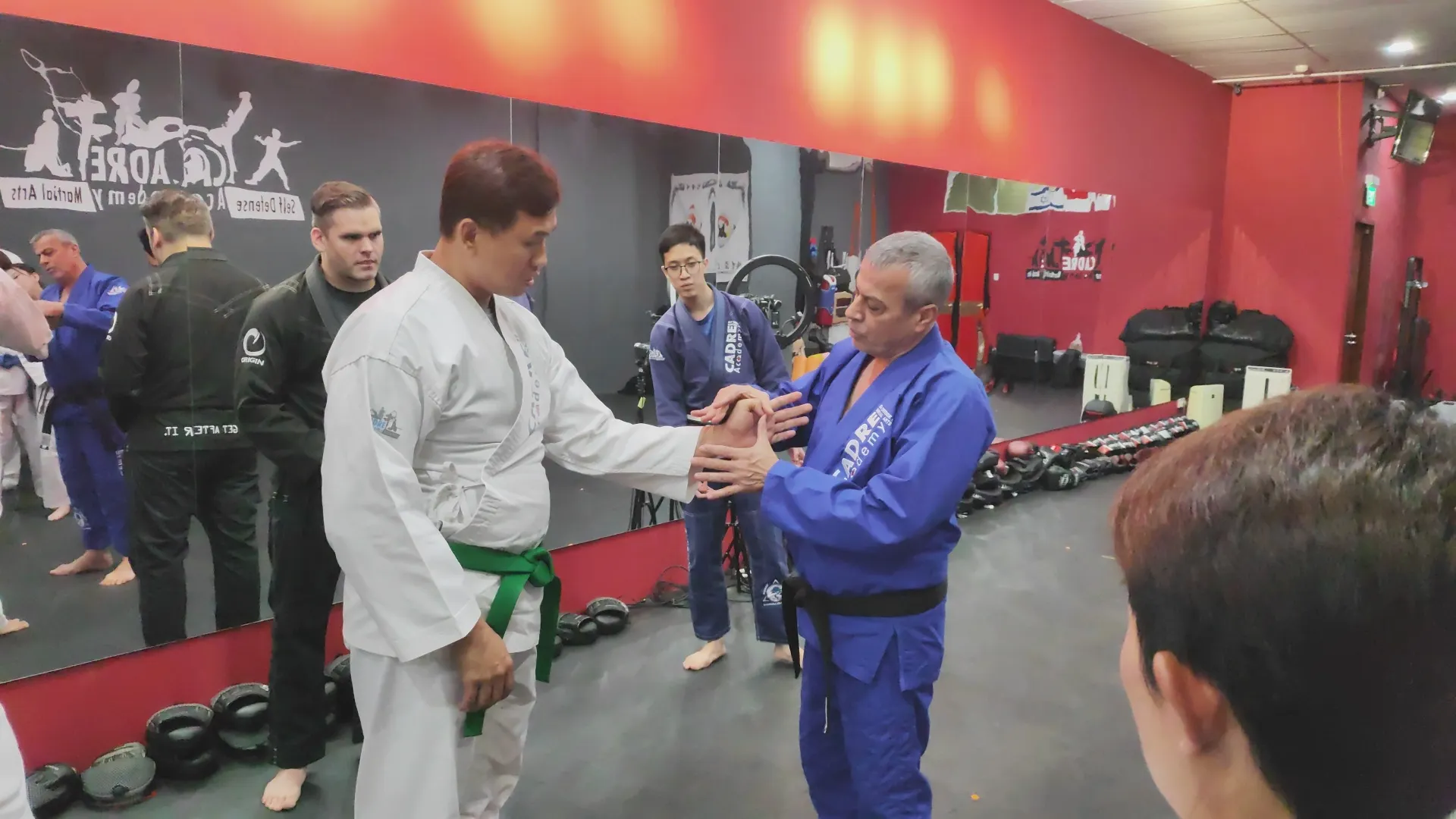 Avi Nardia teaching Integrated Jiujitsu principles during a class at CADRE Academy in Singapore.
