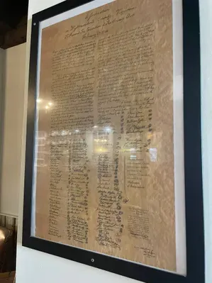 Framed copy of the Leedstown Resolves in Greg Huff's restored 1710 Tavern in Essex County Virginia