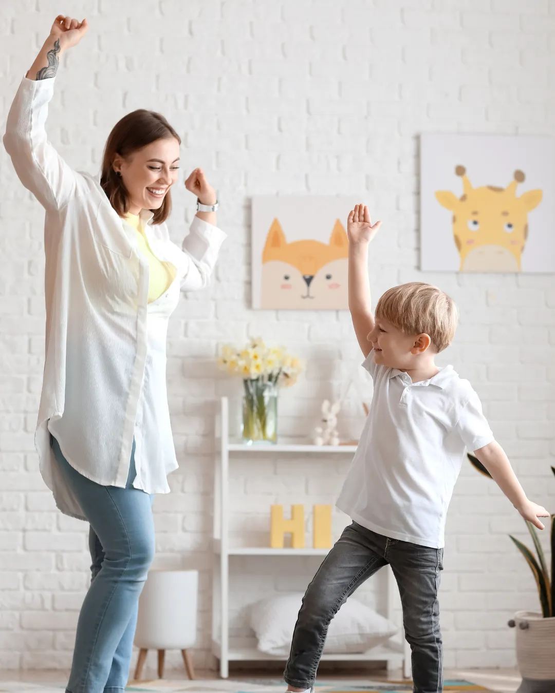 Nanny dancing with a boy