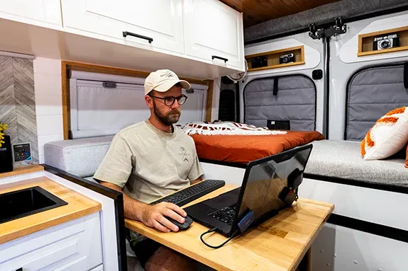Off-grid campervan workstation and mobile office setupOff-grid campervan workstation and mobile office setup