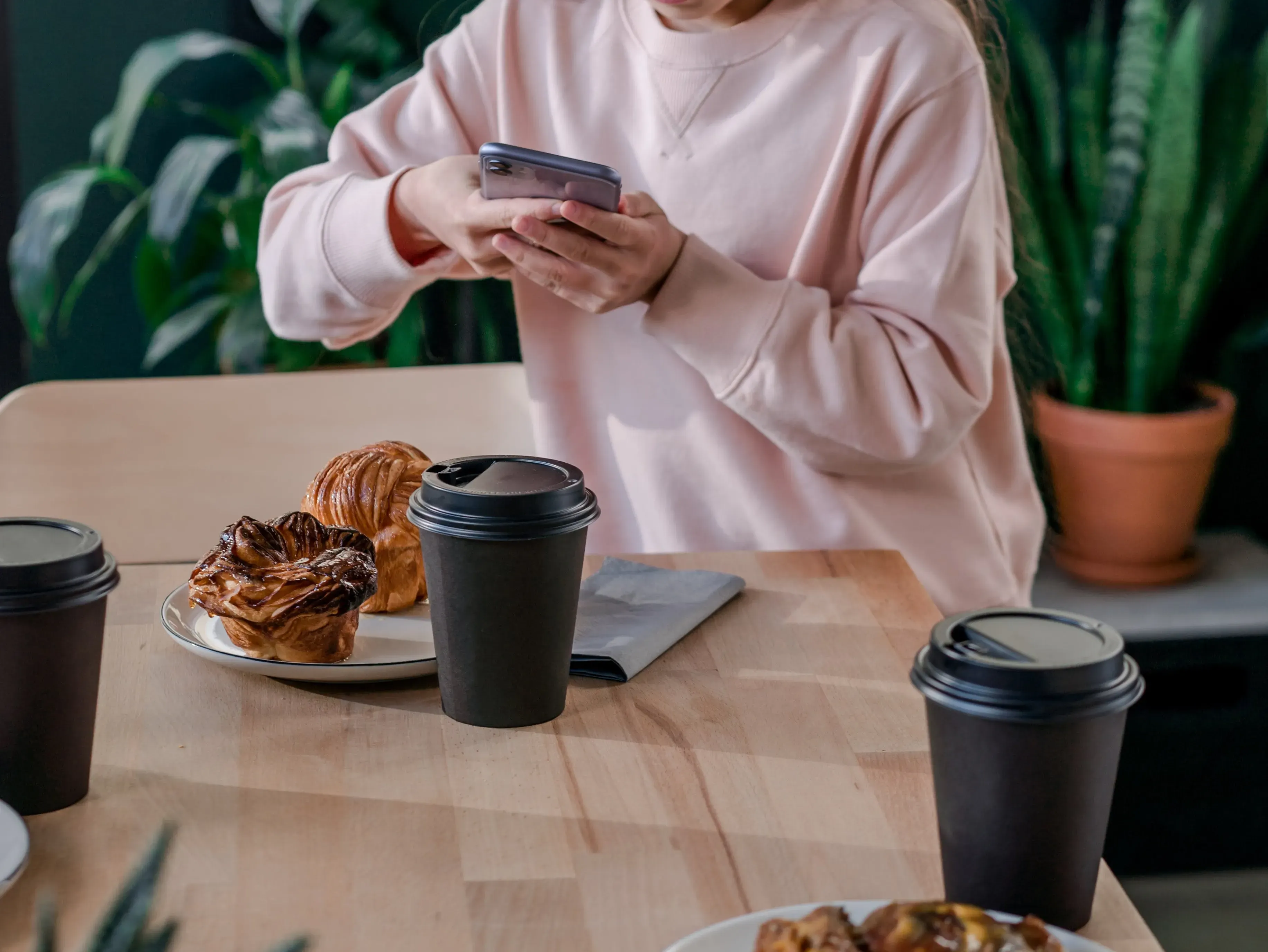 Girl taking pictures of food