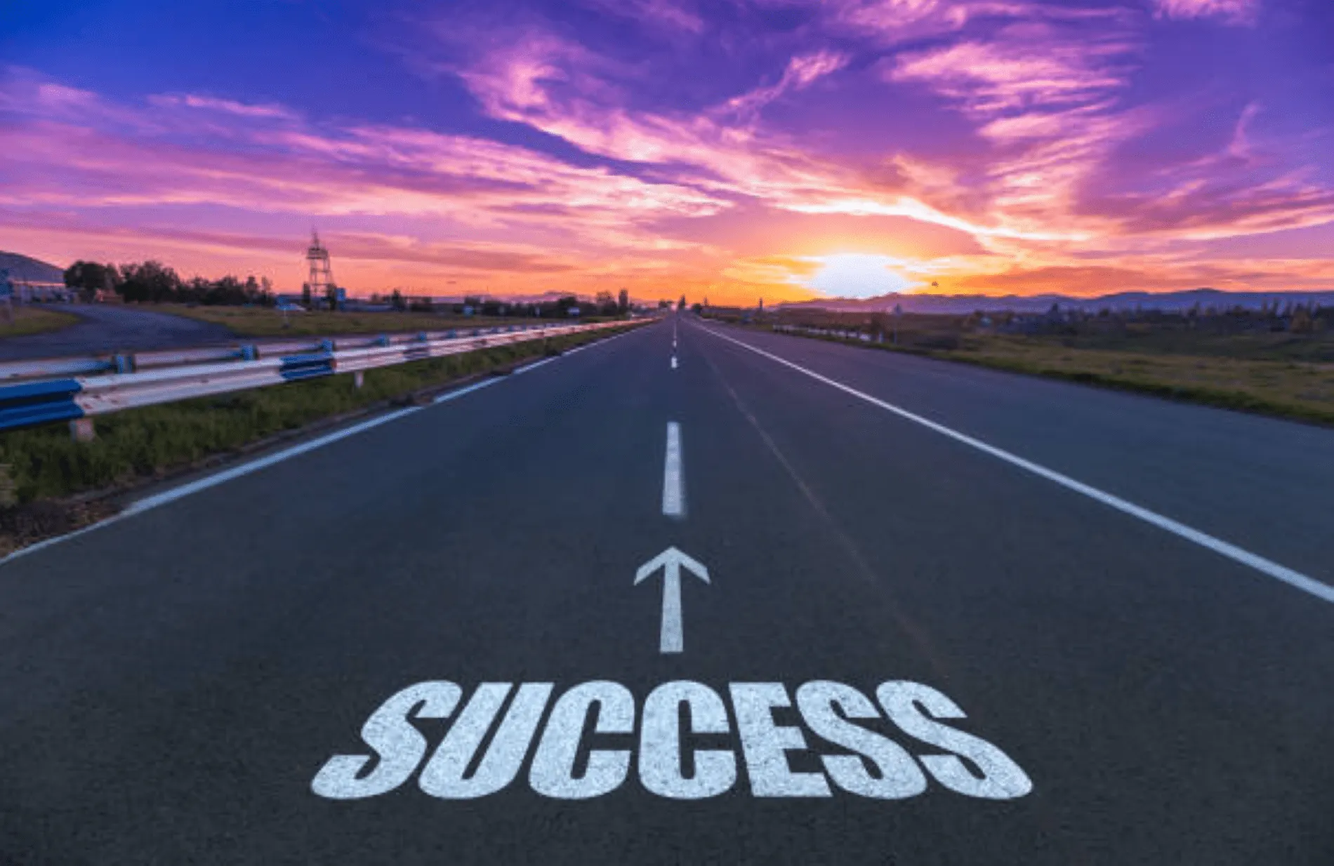 a road with the word "success" written on it