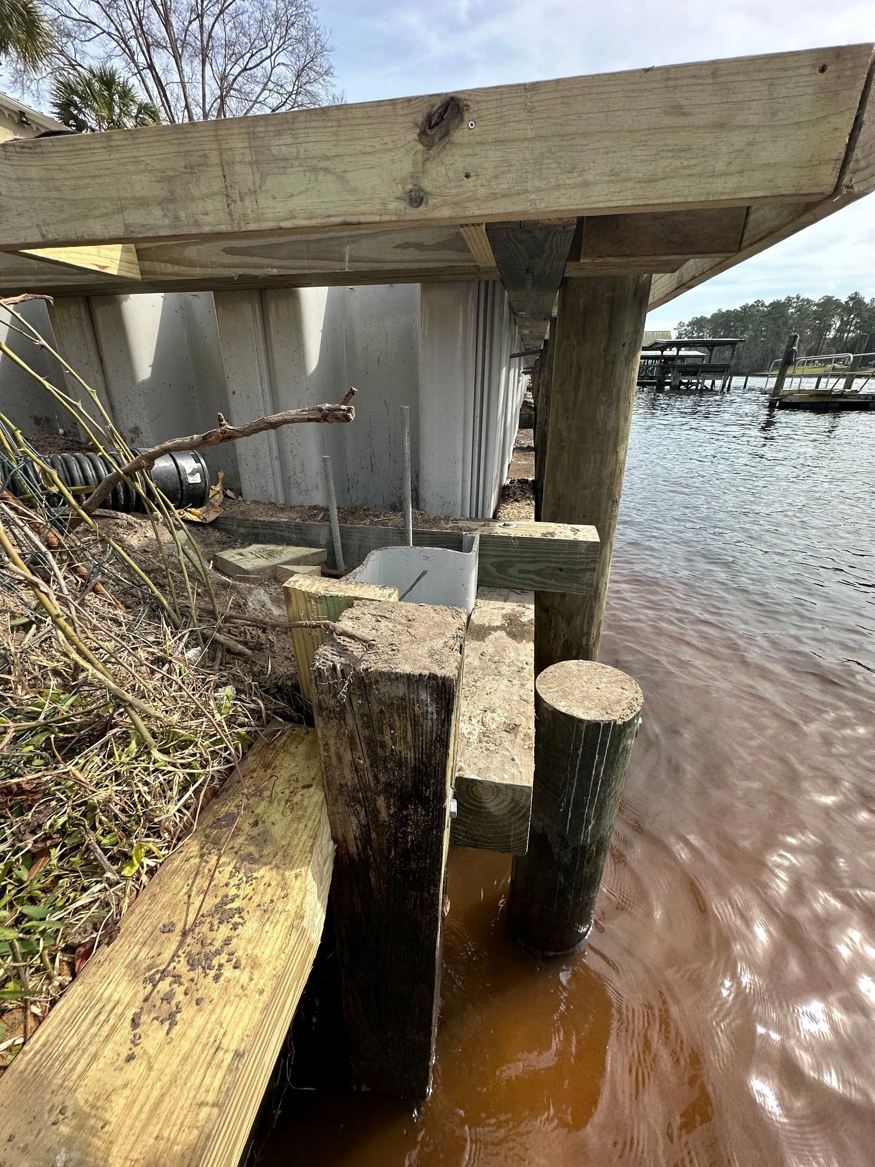 Super Strong Vinyl Bulkhead framed out for composite wood cap under construction in Myrtle Beach SC on the Intracoastal Waterway built by Waterbridge Contractors of the Carolinas