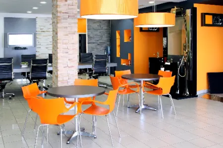 Brake space with orange chairs 