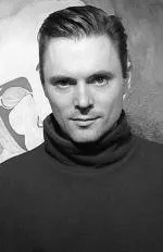 A black and white photo of Timothy Sorsdahl in a turtle neck sweater.