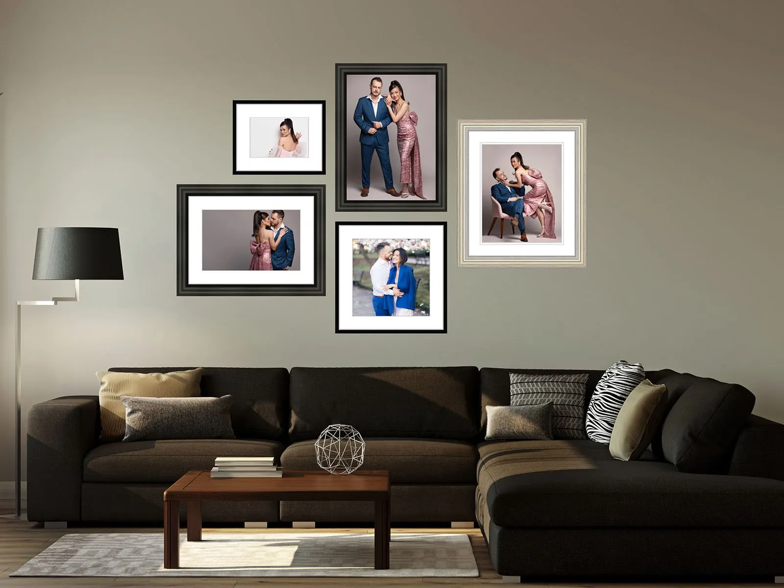 Wall art mockup of images of various sizes hung up on a wall above a couch