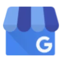 Blue tag icon with a smiling face depicted on it.