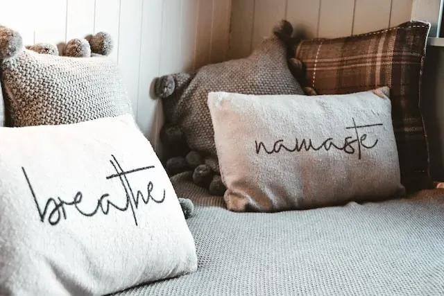 pillows with messages to breathe and for namaste