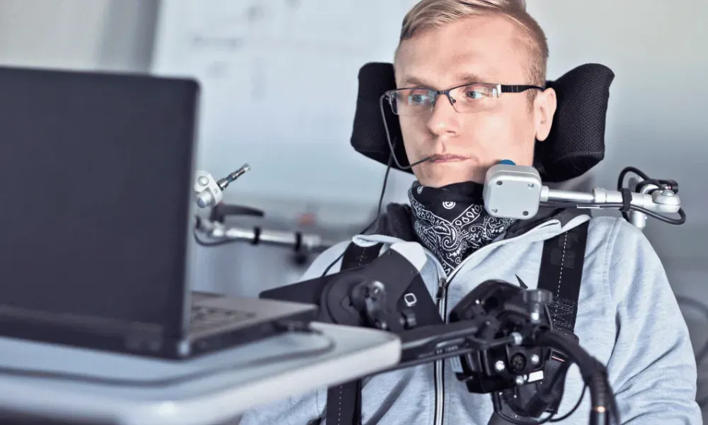 man with disability using computer