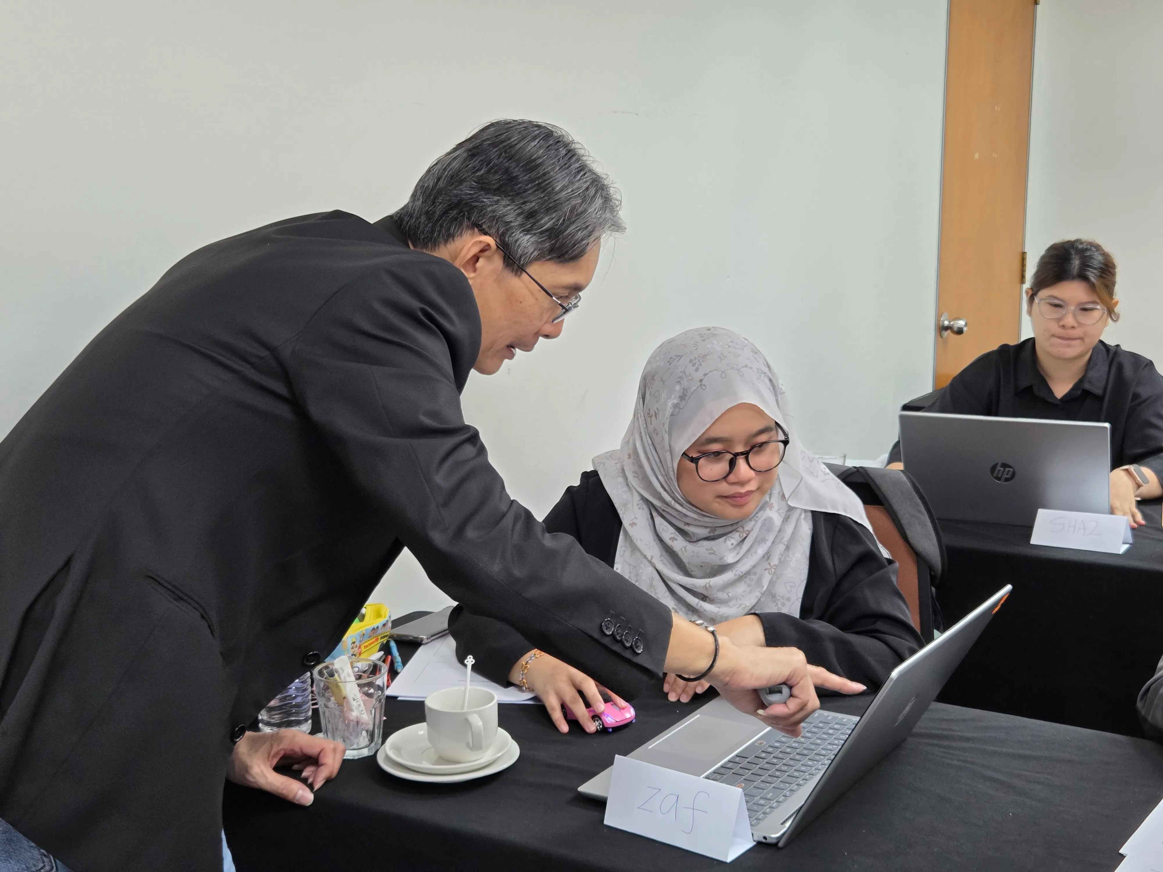 2NRich Asia AI-Powered Solutions training session in Malaysia — participants engaged in experiential learning and team activities