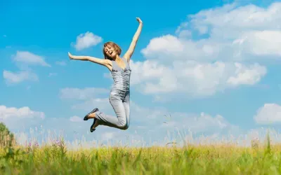 woman jumping joyfully
