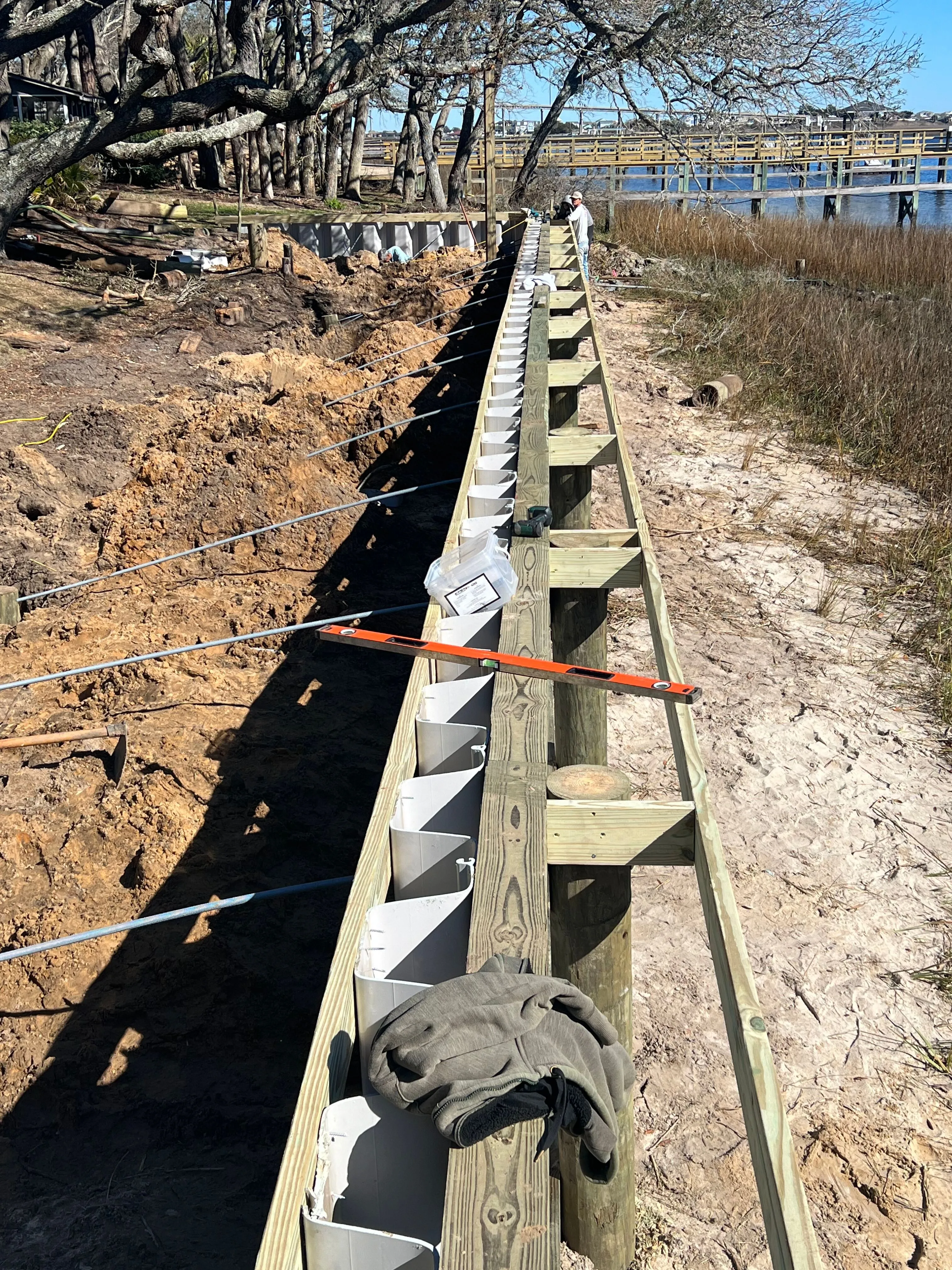 Vinyl Bulkhead framed out for composite wood cap under construction in Ocean Isle Beach NC on the Intracoastal Waterway built by Waterbridge Contractors of the Carolinas