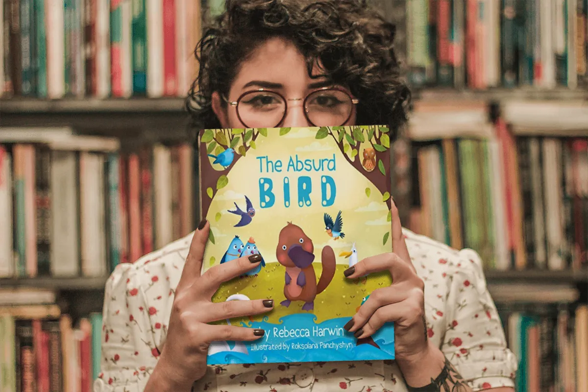 the absurd bird cover with a library in the background