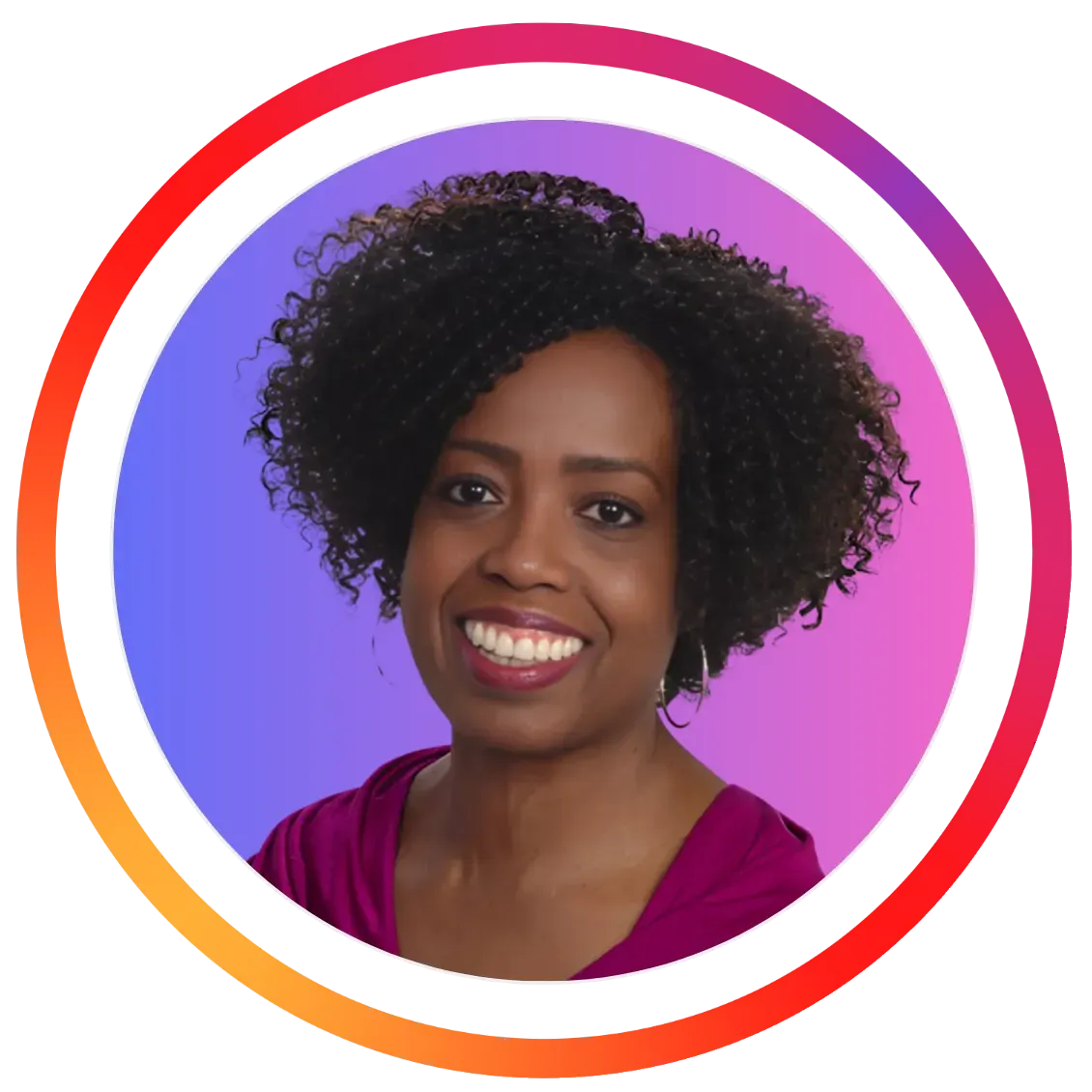 Professional headshot of Coach Judy Handwerker, Certified Wellness Coach, smiling warmly against a soft purple gradient background. She has short, natural curly hair and is wearing a magenta top. The portrait is framed within a circular border featuring vibrant pink, orange, and purple accents, creating a welcoming and energetic appearance. The image conveys professionalism, encouragement, and supportive wellness coaching for women seeking improved health, energy, and lifestyle transformation.