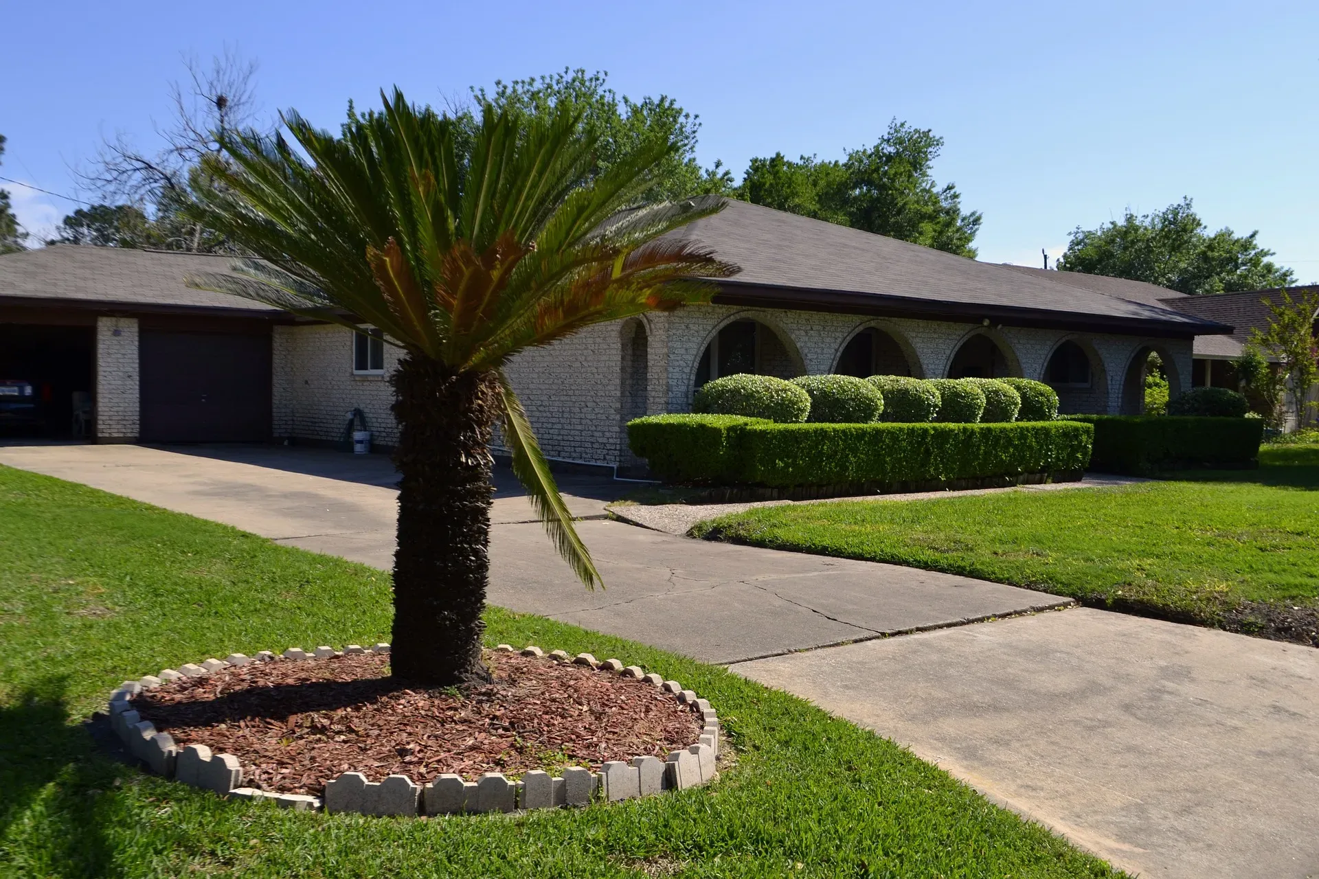 trimmed-hedged-mowed-pressure-washed