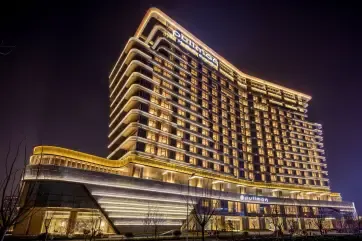 Pullman Suzhou Taicang Exterior Night