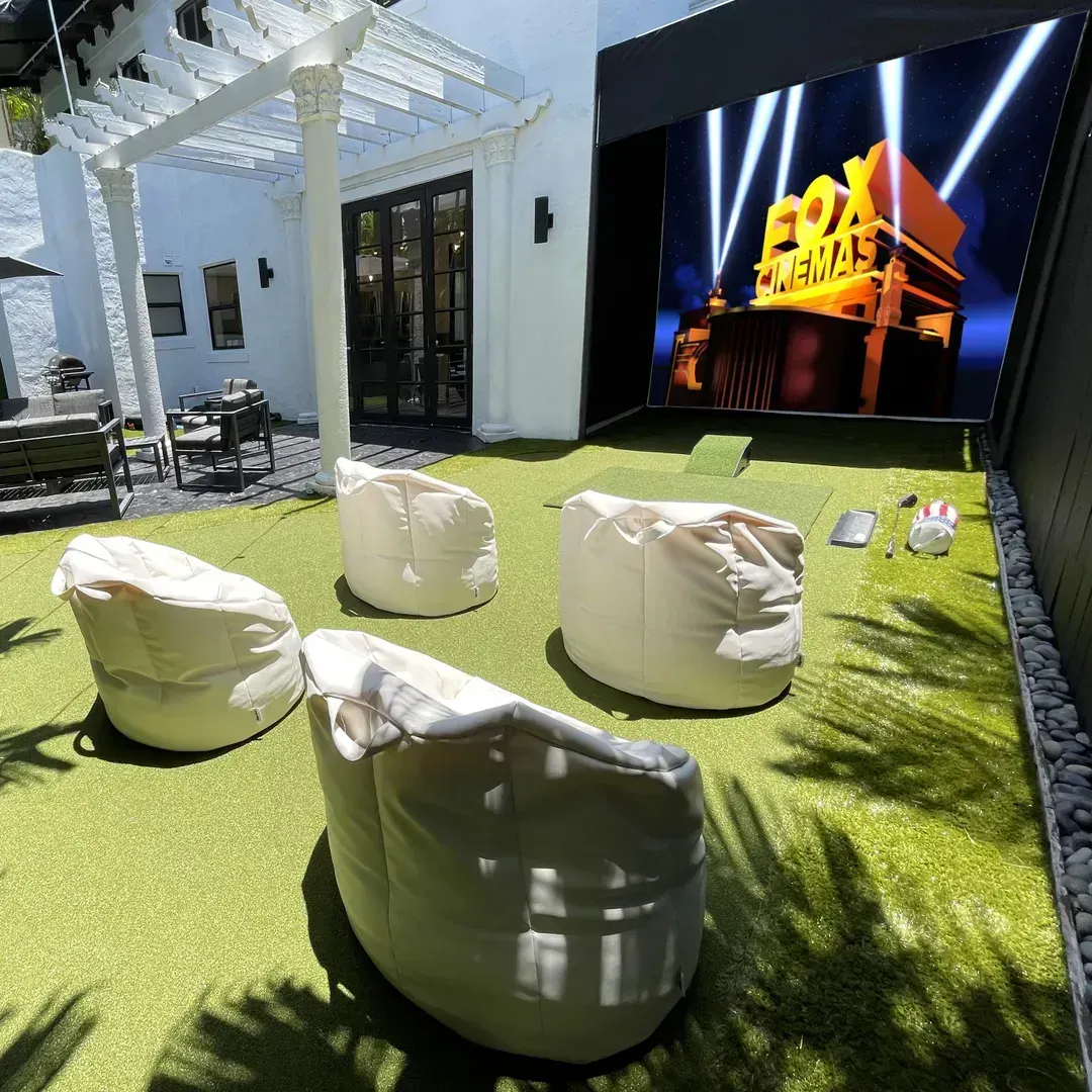 In-home Movie Theater outdoors on a large projector screen for your favorite Movie, Game, or practice your Golf game with a personal Launch Monitor