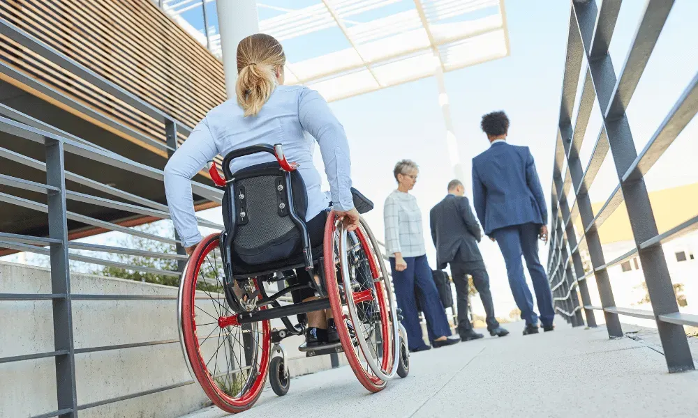 woman in wheelchair on wheelchair ramp