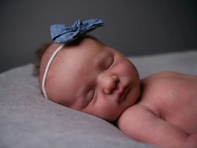 Close-up of a sleeping baby with closed eyes