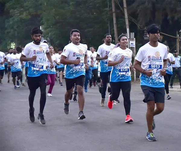 running in marathon pics vapi gujarat