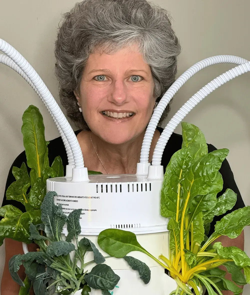 Karen Schriefer with Tower Garden for nutrient-dense gardening.