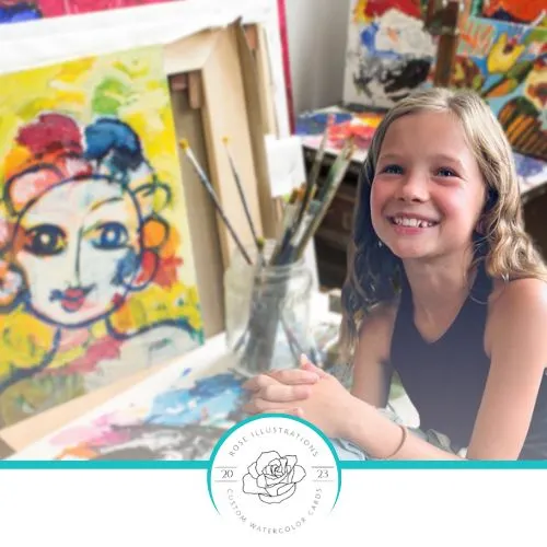 Clara with her watercolor cards and prints for Rose Illustrations