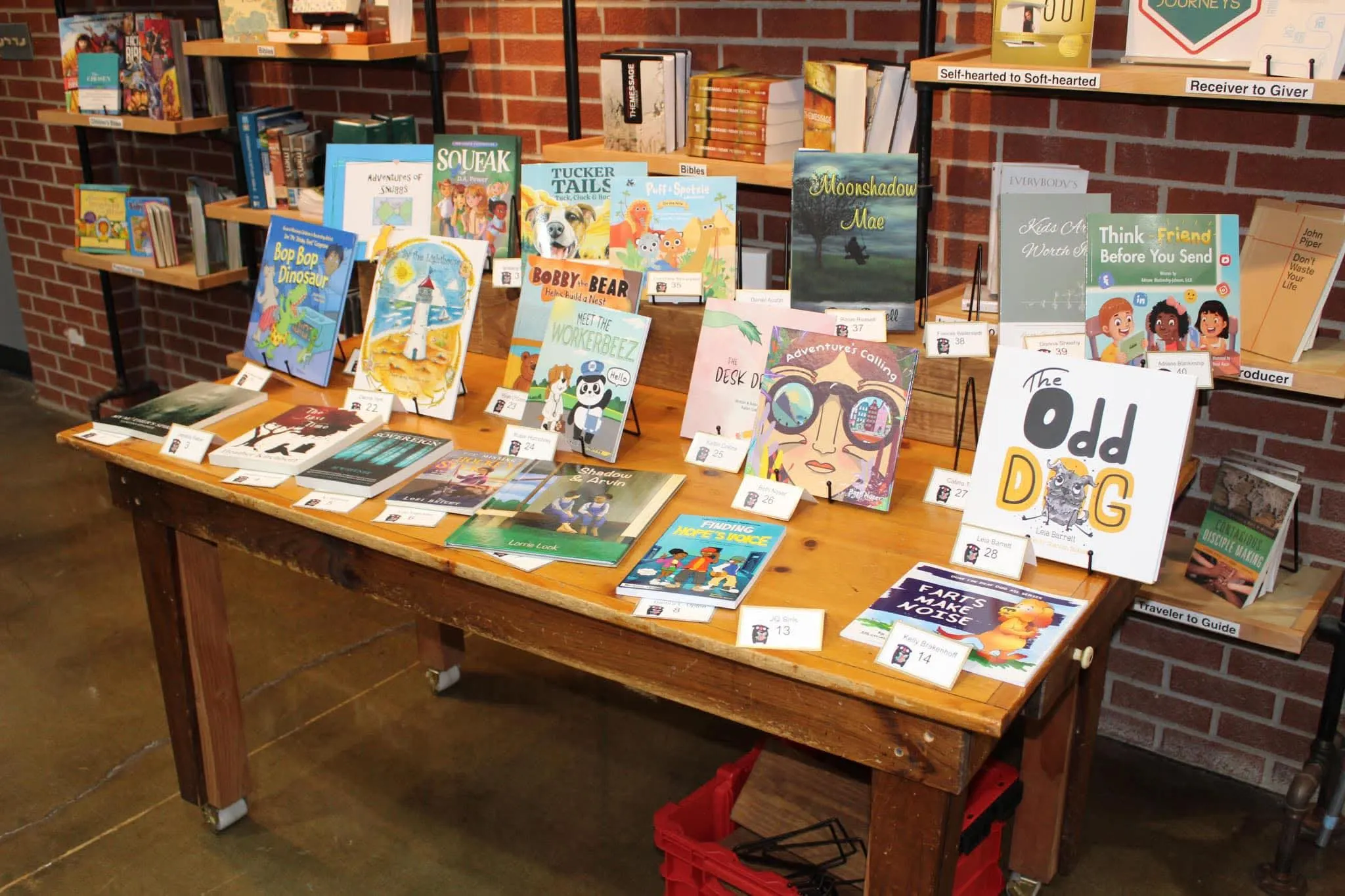 table full of local author children's books