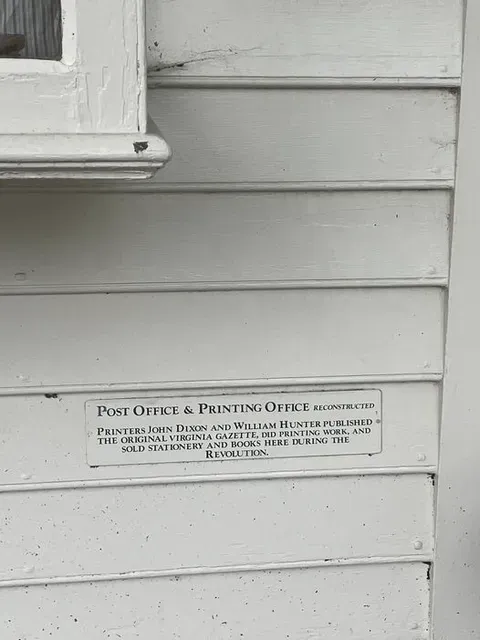 the sign affixed to the reconstructed post office and printing office of Dixon and Hunter in Colonial Williamsburg