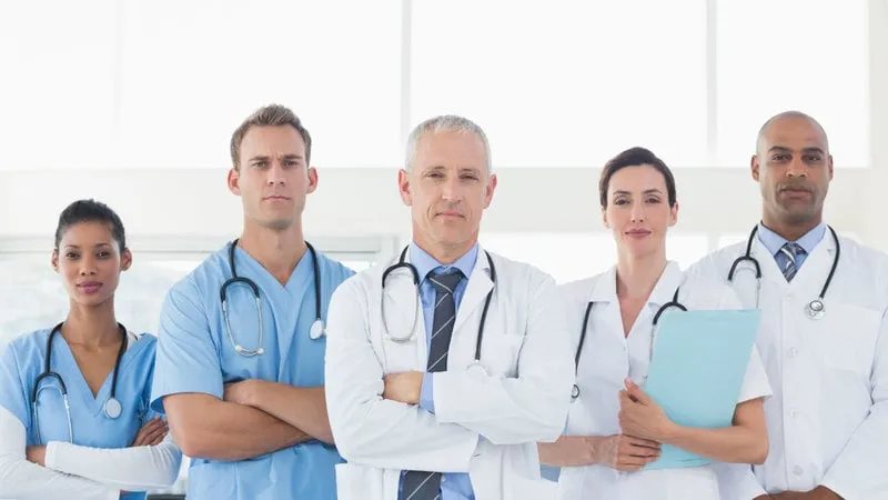 five doctor posing stoic 