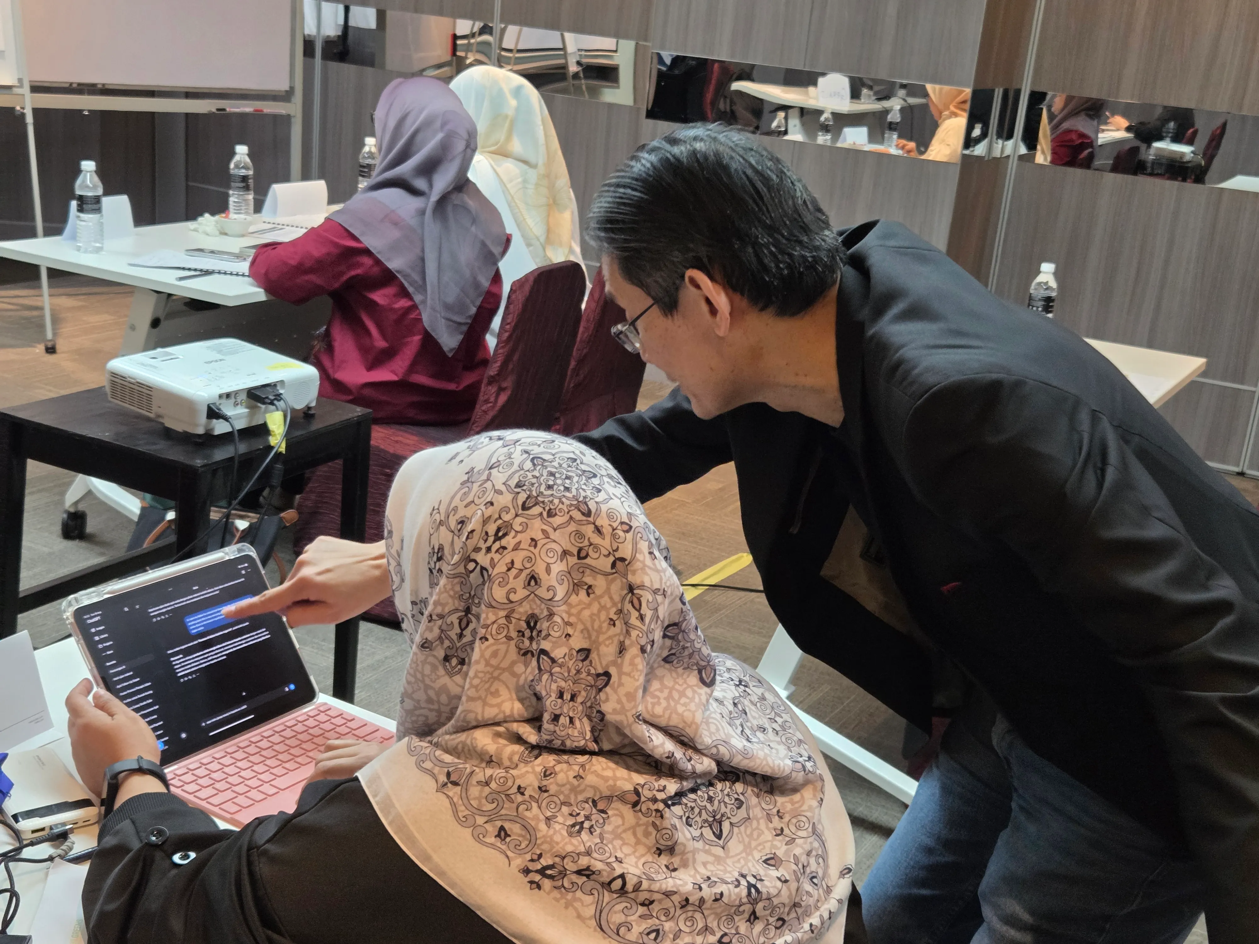 2NRich Asia AI-Powered Solutions training session in Malaysia — participants engaged in experiential learning and team activities