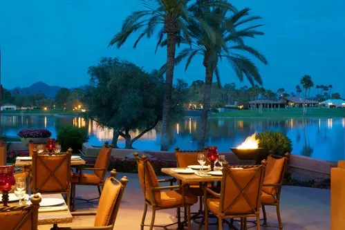 Enjoy the beauty of a Resort with a Lake View Grill, only a few steps away.