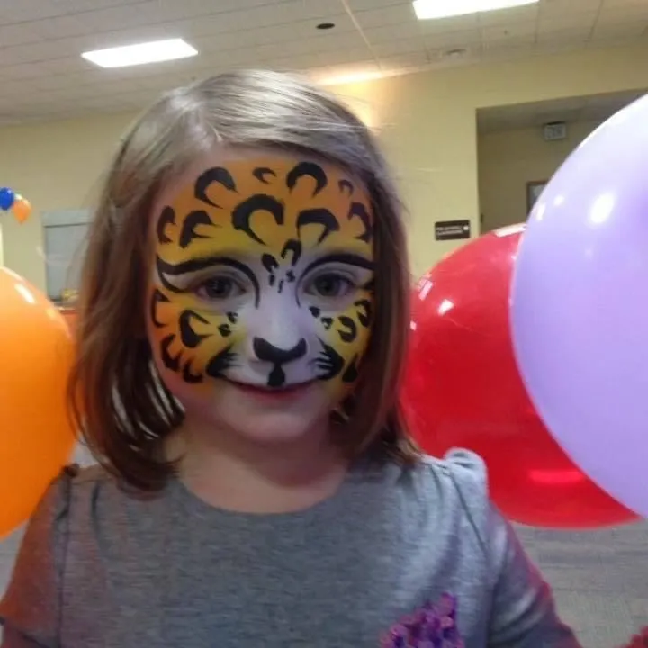 Cheetah Face Paint at a Birthday Party by Serendipity Face Painting Charleston WV