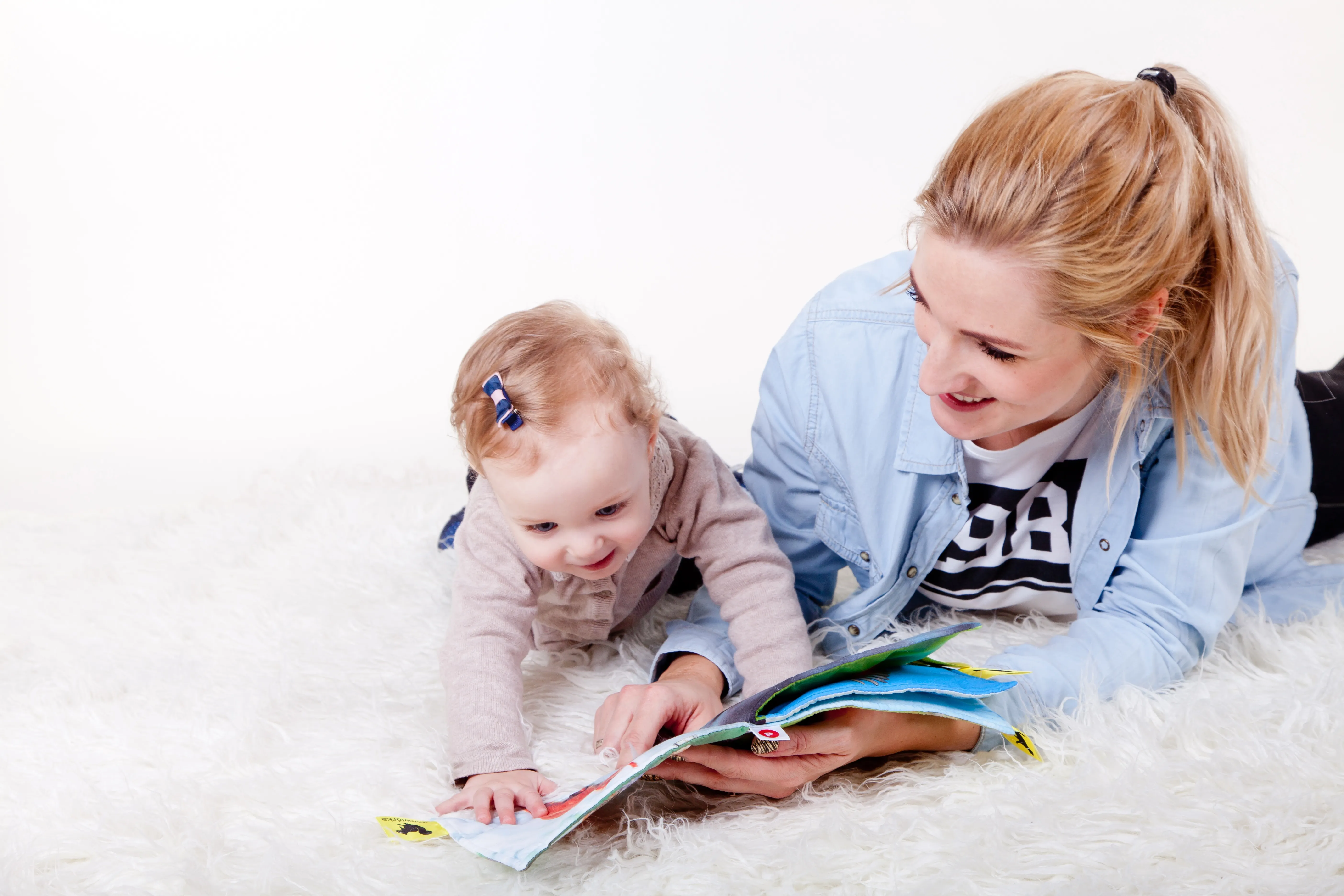 mother and child reading a book you are unique