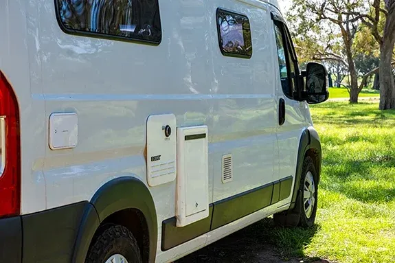 External gas, power, and hot water system on Australian self-built campervan
