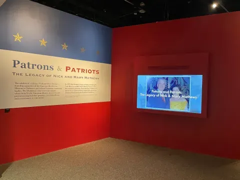 Entrance to Patrons and Patriots exhibit honoring Nick and Mary Mathews during VA 250 celebrations
