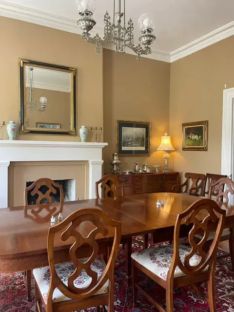 1830s oil lamp chandelier in the dining room of the 19th century Essex Inn bringing Essex County history to life by Greg Huff