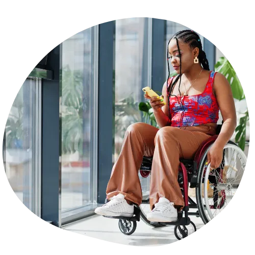 Assistance with Daily Living, Women with a phone a wheelchair