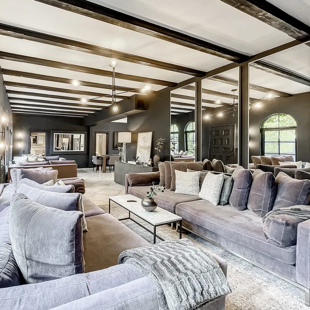 living room is adorned with an original Art Deco fireplace