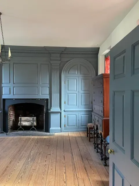 Faulcon House at Smith's Fort in Surry Virginia has two cupboards with butterfly shelves flanking the fireplace.