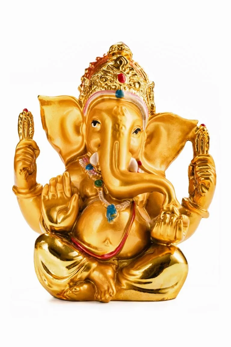 Golden statue of Lord Ganesh with beautiful studded diamonds, emerald and pearls