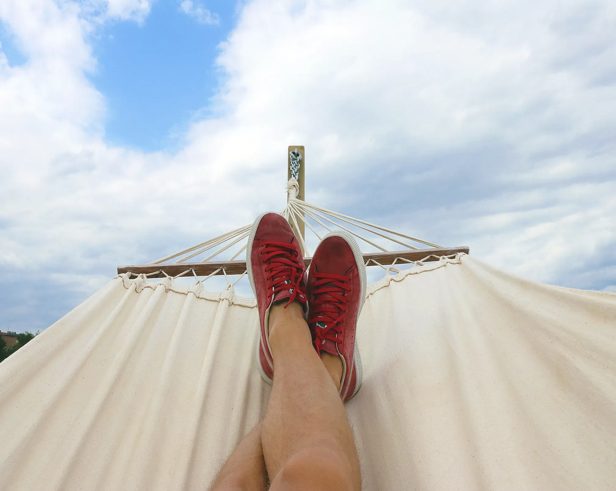 Legs crossed on a hammok relaxing