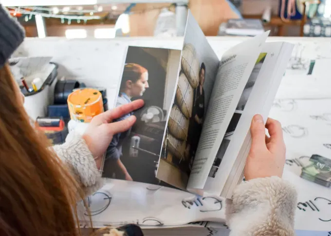 little girl reading a book