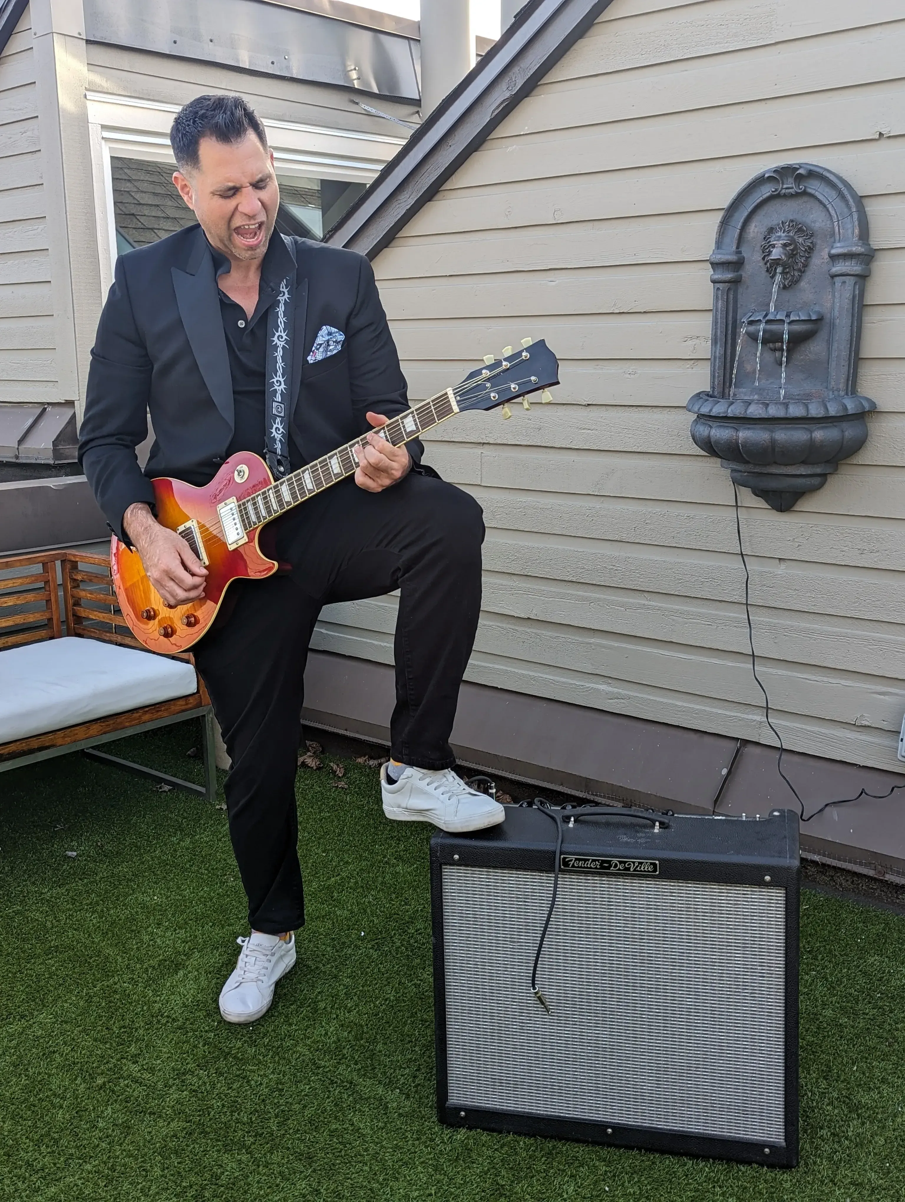 Devin Bisanz playing the guitar