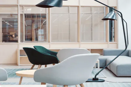 Office with chairs and sofa 