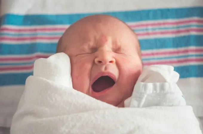 A serene sleeping baby just woke up