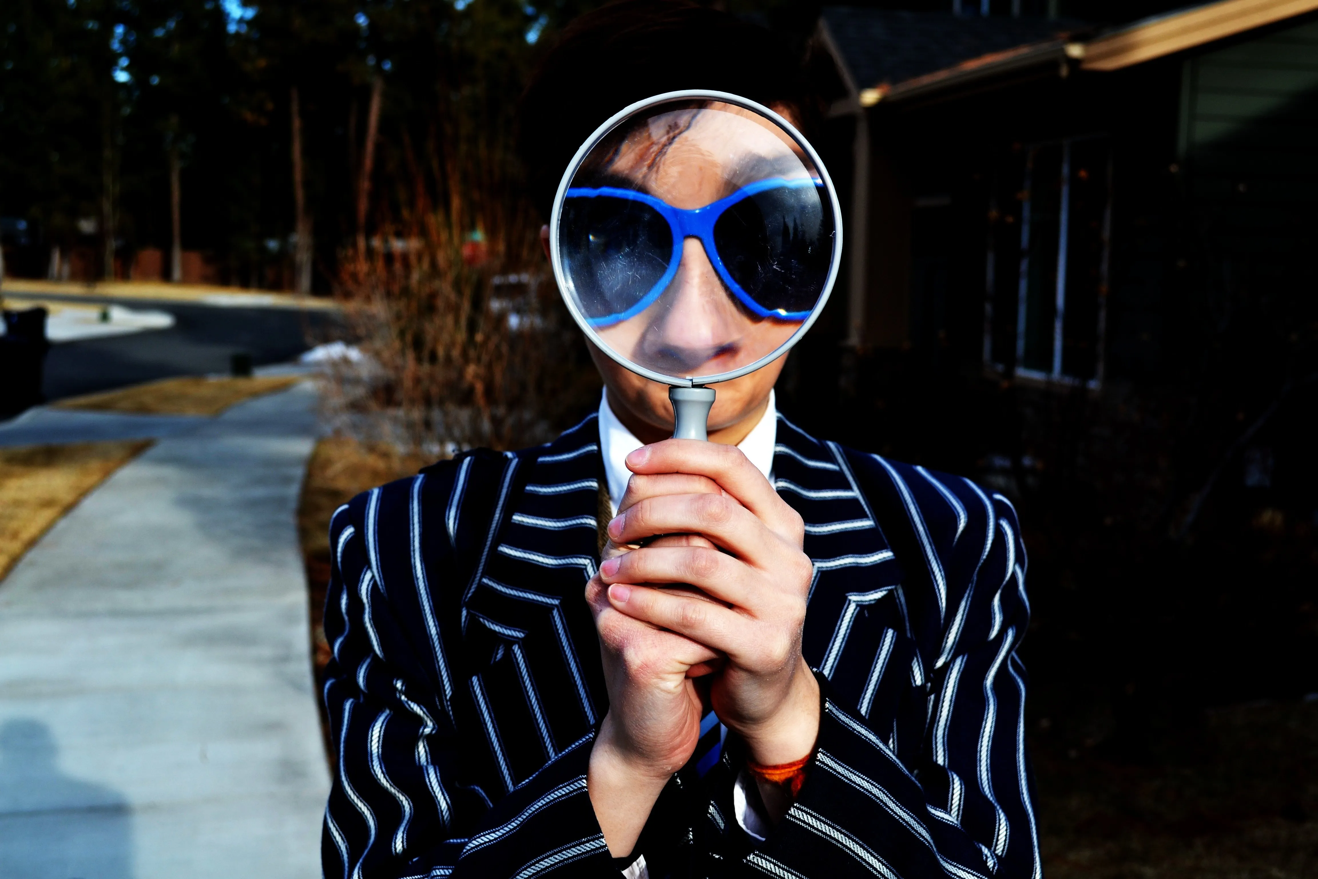 Person with magnifying glass