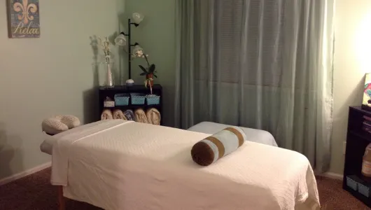 Image of a soothing massage table set up in preparation for massge