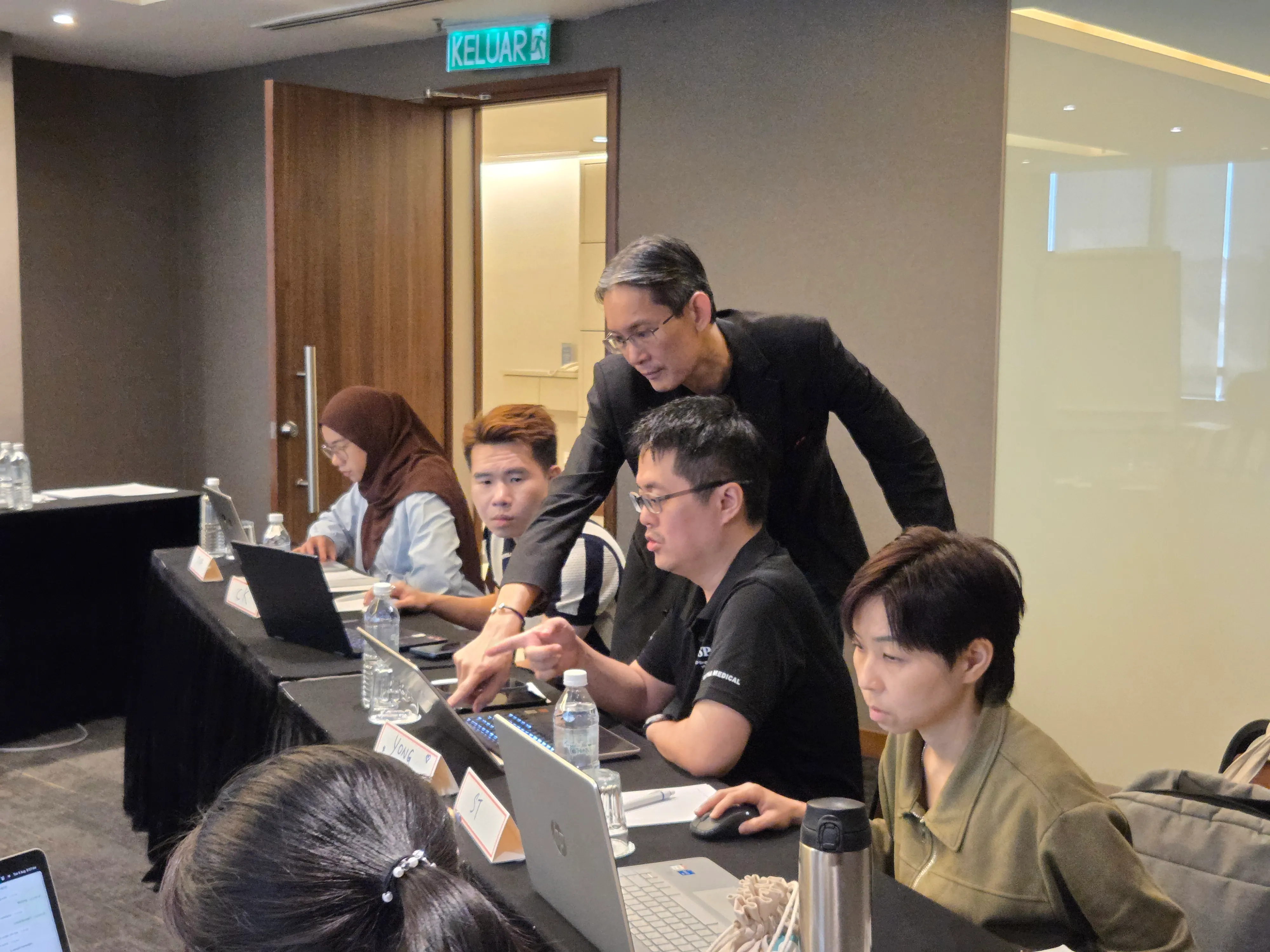2NRich Asia AI-Powered Solutions training session in Malaysia — participants engaged in experiential learning and team activities